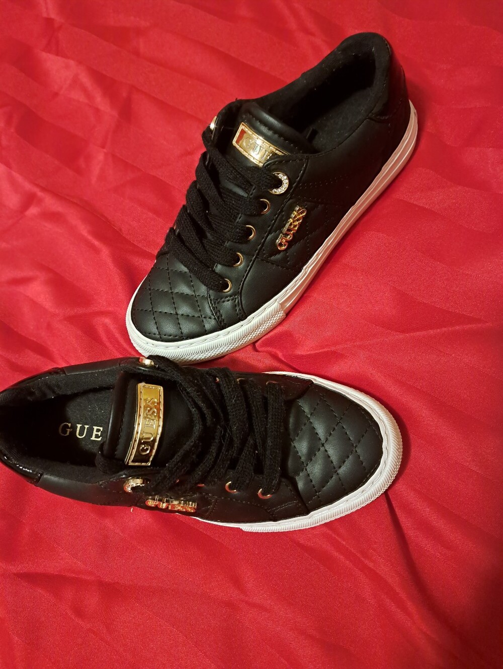GUESS women  Black Quilted Low-Top Sneakers with Gold Hardware